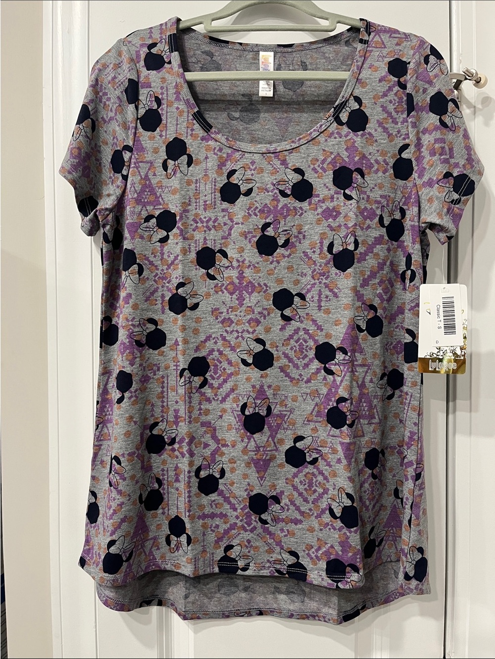 Disney Gray Short Sleeve Tee with Purple Geometric & Black Minnie Silhouettes.